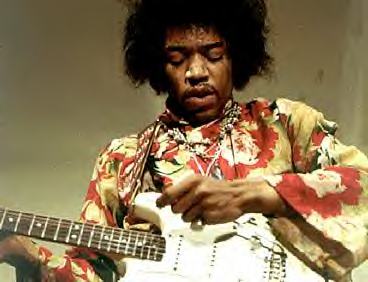 Jimi Hendrix grabbing the "whammy bar" on his Fender guitar in 1967.