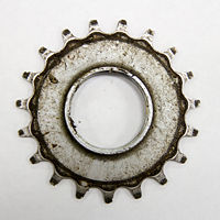 Notice the extra lip on the inside diameter of the sprocket required for the retaining ring to seat against. This feature may be designed away.