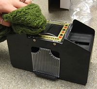 Figure 6: Cleaning the Shuffler with a dry rag