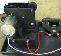 Figure 8: The mechanical and electrical components of the card shuffler that make it work