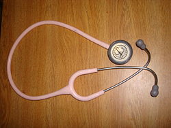 A pink Littmann brand stethoscope.