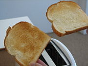 Step 6: Wait while bread is toasting to desired level