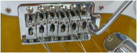 A Floyd Rose Speedloader Bridge, the newest and most technologically advanced guitar bridge currently in production