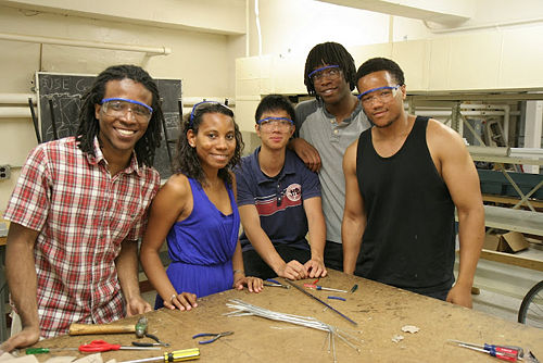 Figure 10. Group picture taken at MechE Lab.  (From Left to Right) Conroy Brown, Lizmarie Comenencia Ortiz, Dennis Ou, Marcus Townsend, David Carter