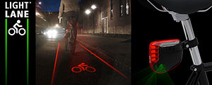 Concept: LightLane, Clamps onto the seat post and acts as a taillight and virtual bike lane [1] source
