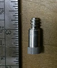 The blade adapter shaft that appears to be machined